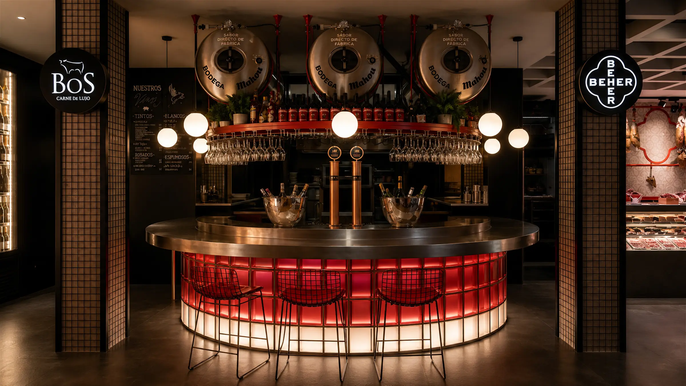 Barra curva iluminada en rojo del proyecto Beher Valladolid de The Loto Lab